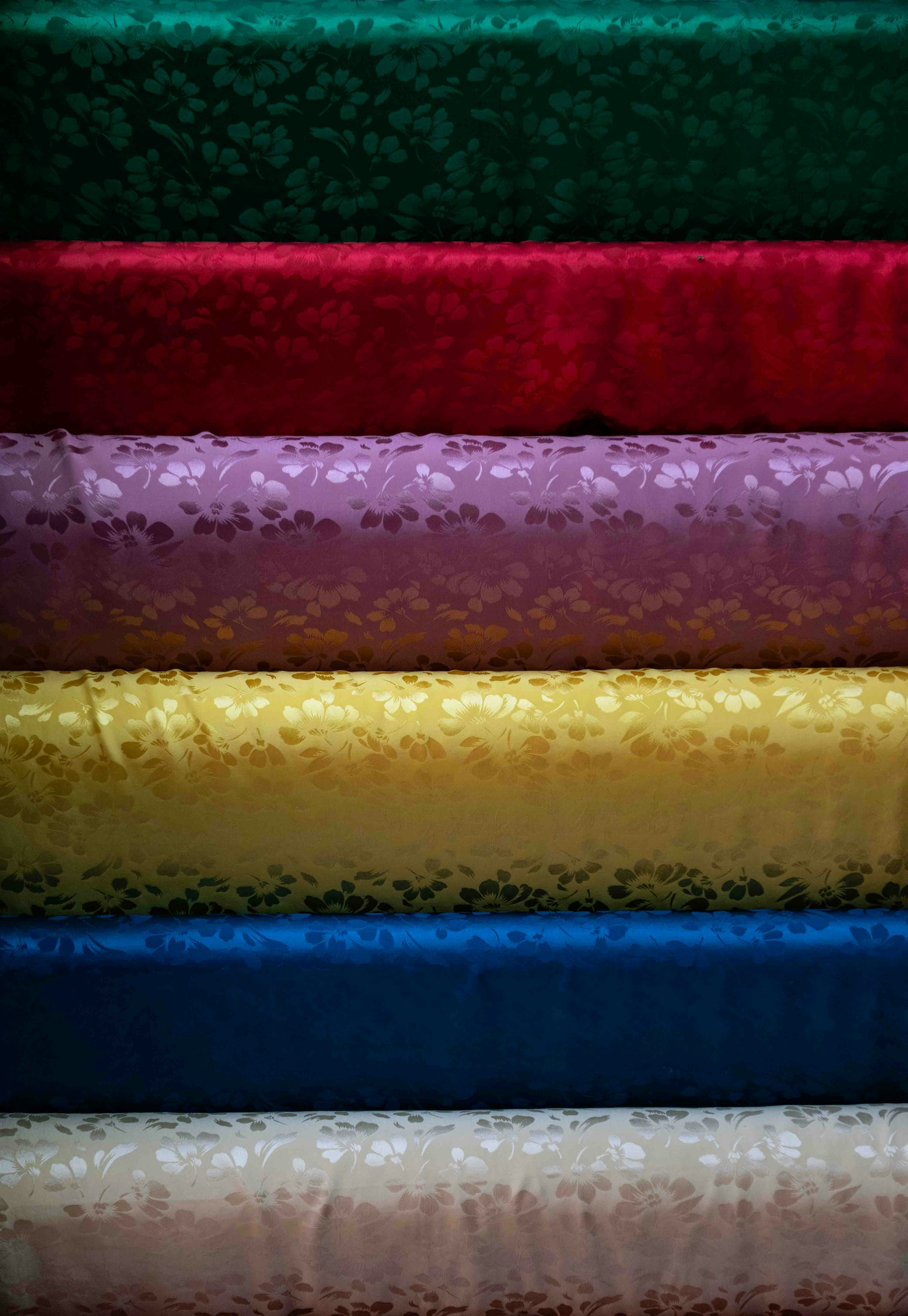 Stacked rolls of finished textile